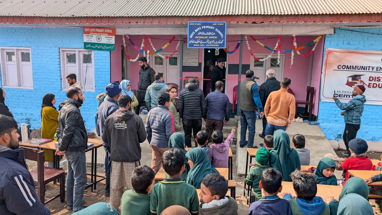 Students and guests gathered outside the government school in Bardalav
