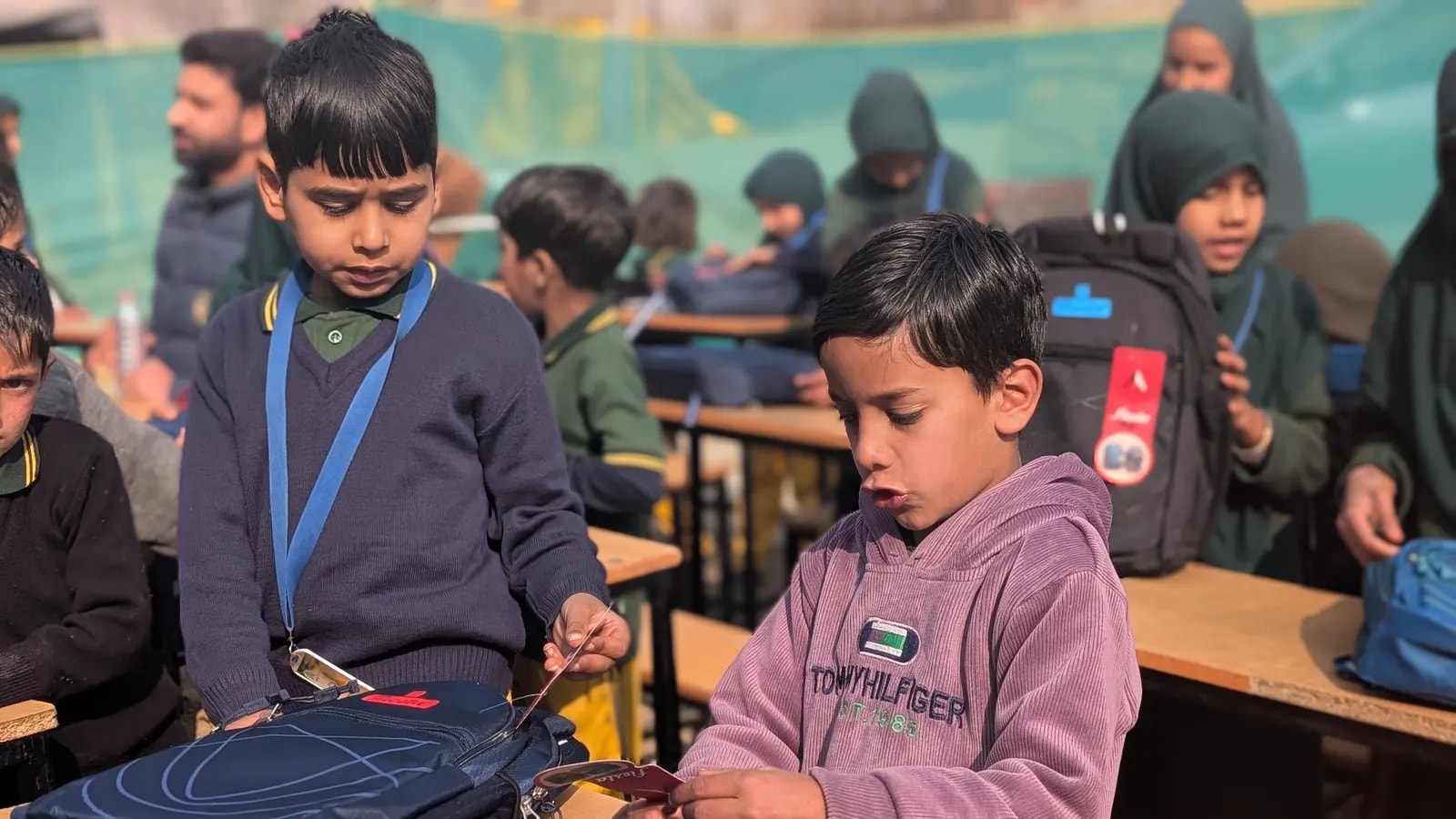 Students opening their new school bags