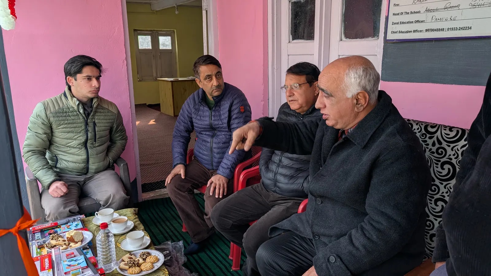 Guests in conversation at the school